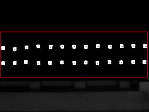Source pin-light capture: bright tip regions are more isolated from the background; original red box retained.