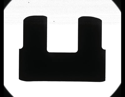 The camera capture shows a forked shaft profile with a bright slot between two dark shoulders and a clear outer contour.