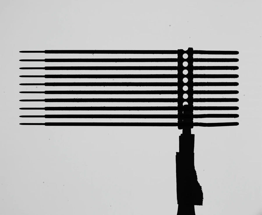 Machined-part pin capture from the vertically mounted test; source lens LS-VCM110-120 with collimated illumination.