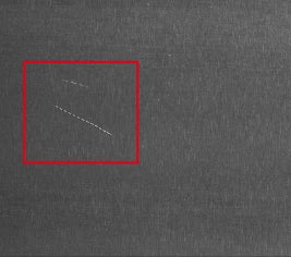 Fourth-generation line-light capture: the marked feature has stronger visible contrast; the red box is original.