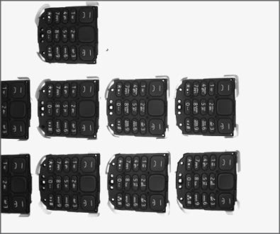Source white four-sided-light capture: printed legends are visible on several separate moulded keypads.