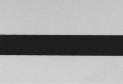 Original collimated-panel side: dimmer background and a more distinct outline boundary.