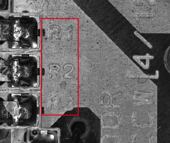 Source lower-contrast lettering capture; original red marking box retained.