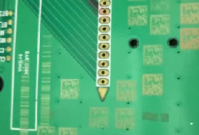 Same industry, second task: QR codes screen-printed on a bare board.