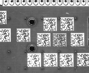 Separate QR-code application: angled white LS-4BRH15016 lighting improves contrast of the printed codes. No decode-rate result is given.