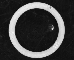 Source blue-light capture; local marks remain visible on the bright ring.