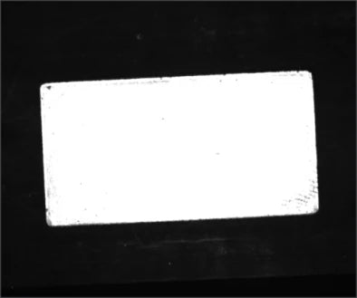 Source metal-positioning capture labelled with a 4 µs exposure under the strobe coaxial light.