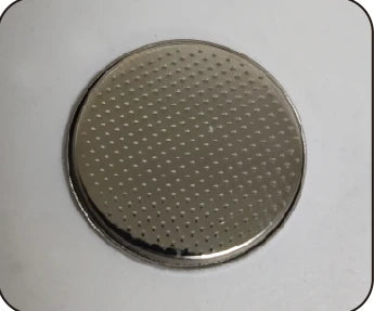 Textured metal disc shown in the source sheet.