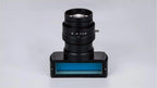 Coaxial illumination line scan lens